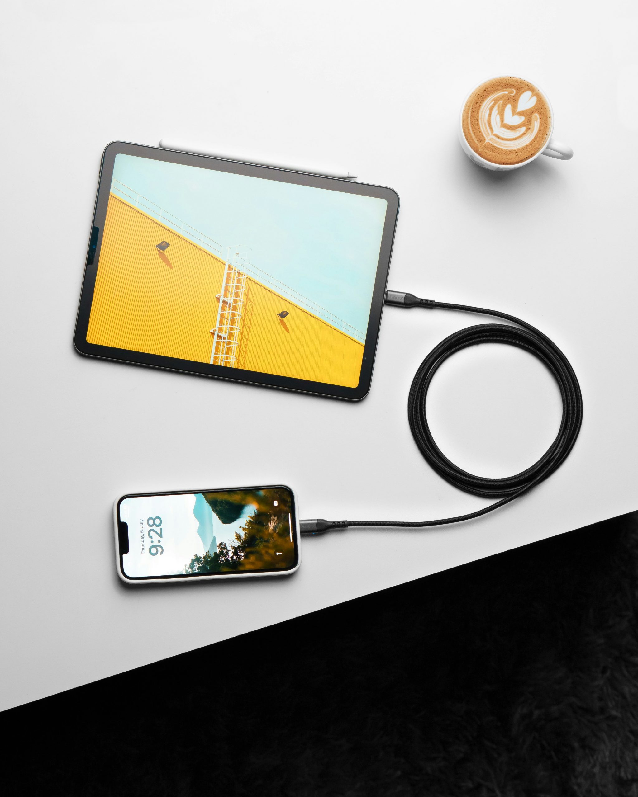 Person holding a smartphone browsing a clean and responsive e-commerce website layout