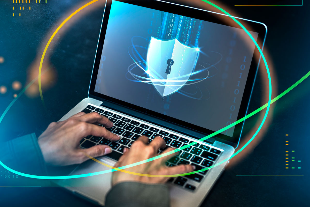 hands-typing-on-a-laptop-with-security-shield